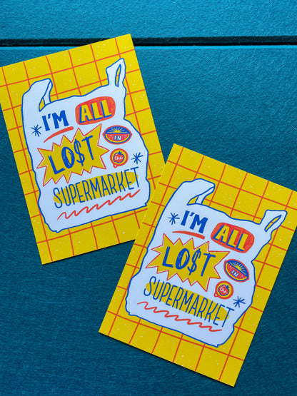 Two 'I'm All Lost Supermarket' 5x7" prints on a blue felt  background