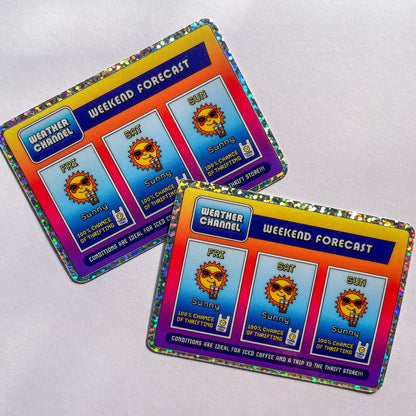 Two rectangle stickers with a glitter border and a nostalgic and playful weather forecast illustration predicting sunny days ahead filled with iced coffee and good chances of thrifting on a white background